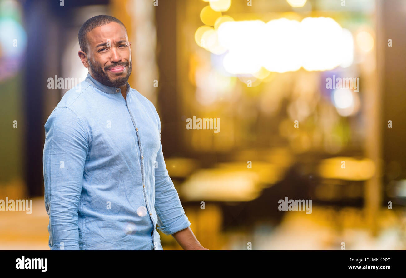 Outdoor portrait upset african man hi-res stock photography and images ...