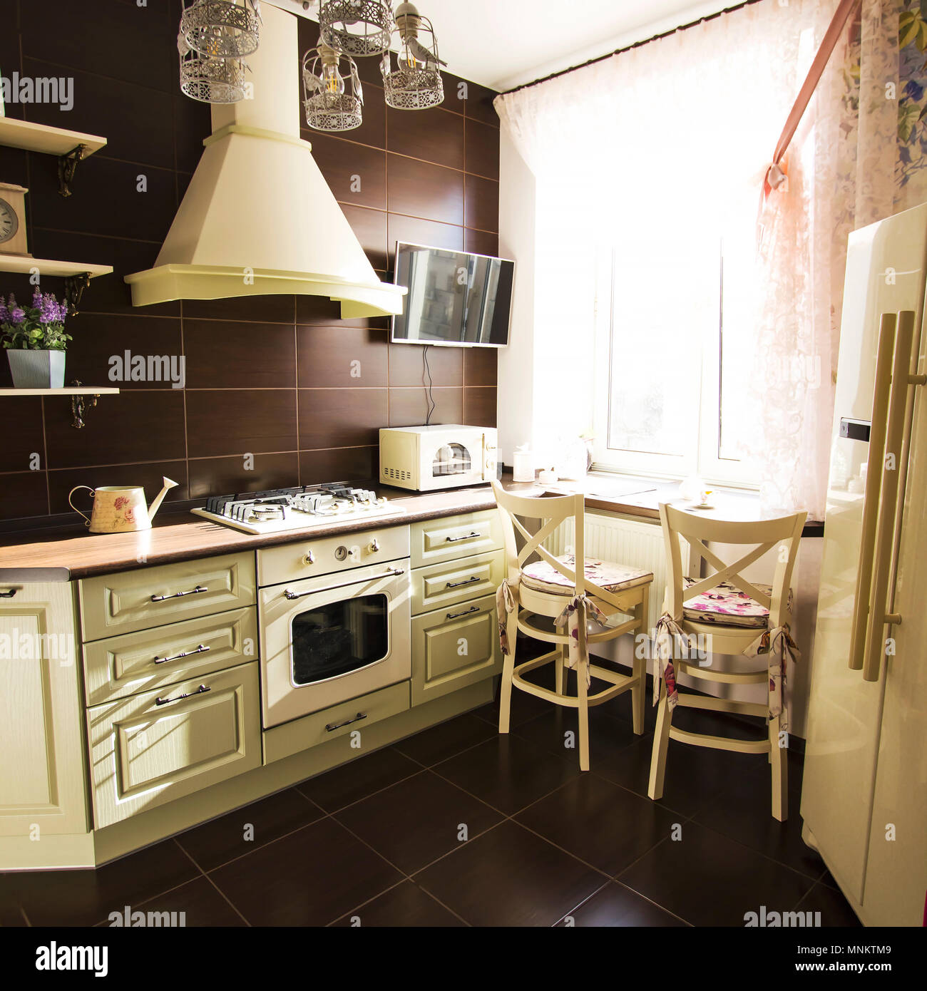 Kitchen Interior In Bright Colors Stove Refrigerator Chairs