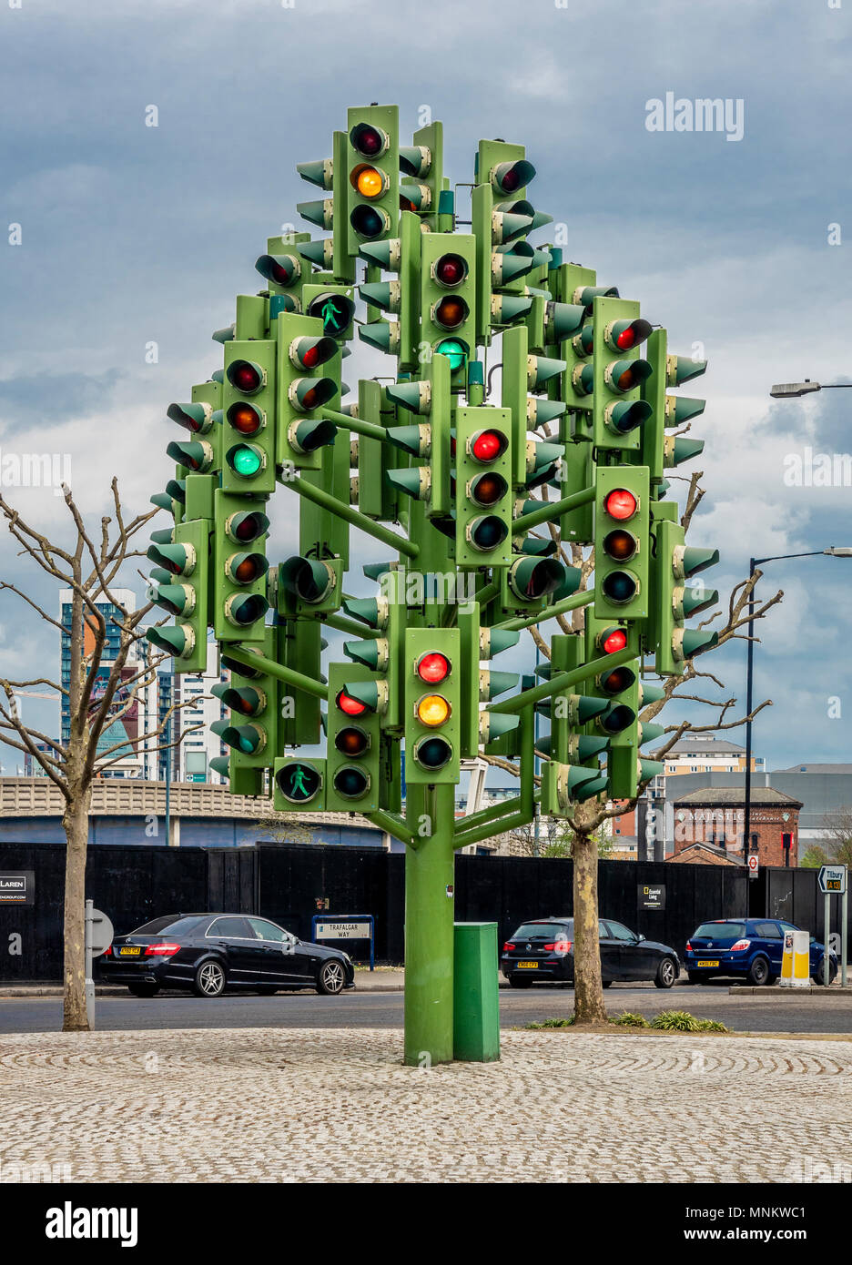 Traffic Light Tree, sculpture by the French sculptor Pierre Vivant, Trafalgar Way roundabout, outside Billingsgate Market, London, UK. Stock Photo
