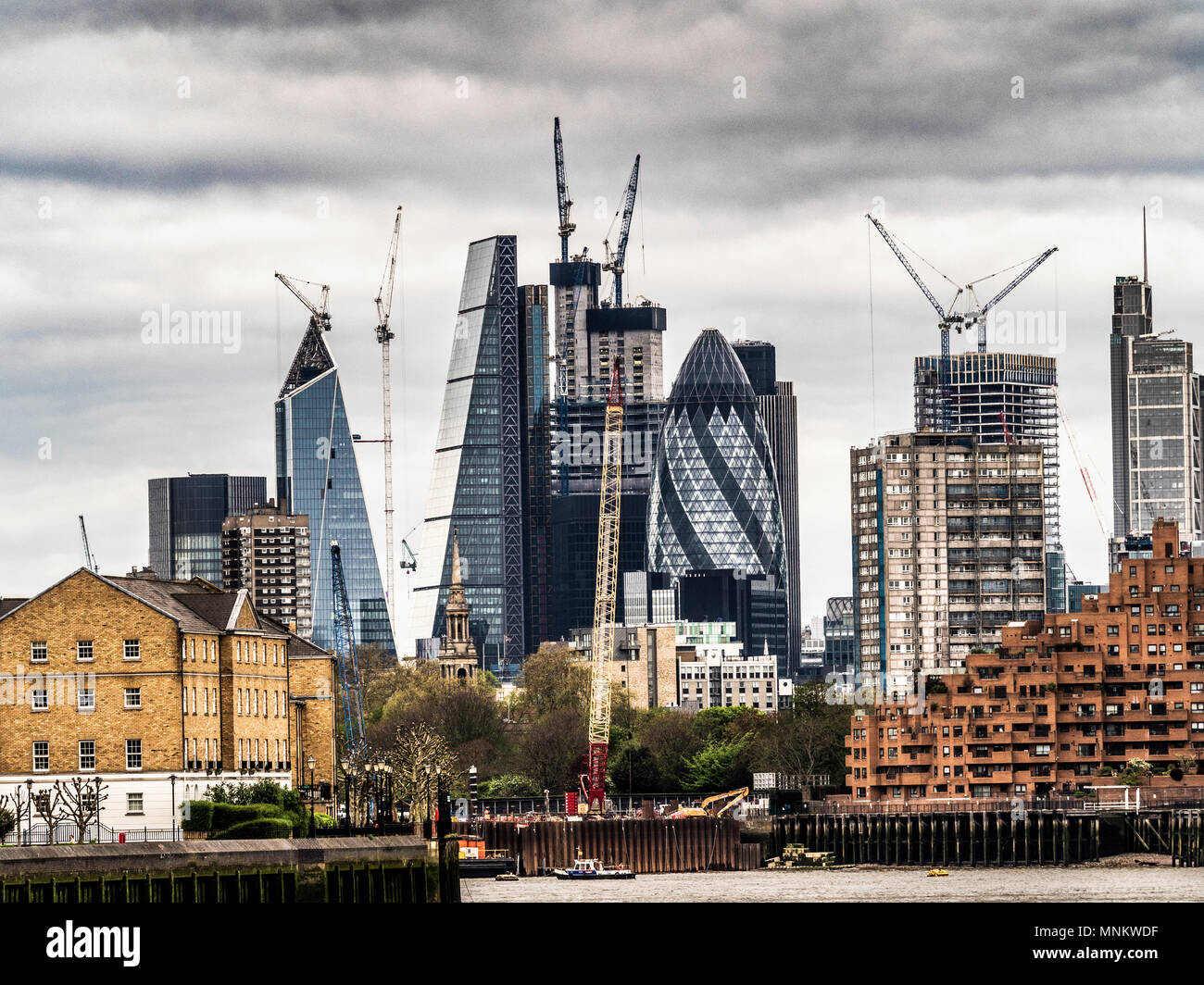 London financial district viewed from the East of the river Thames. Foreground right is Free Trade Wharf: Luxury apartments on the north bank. Stock Photo