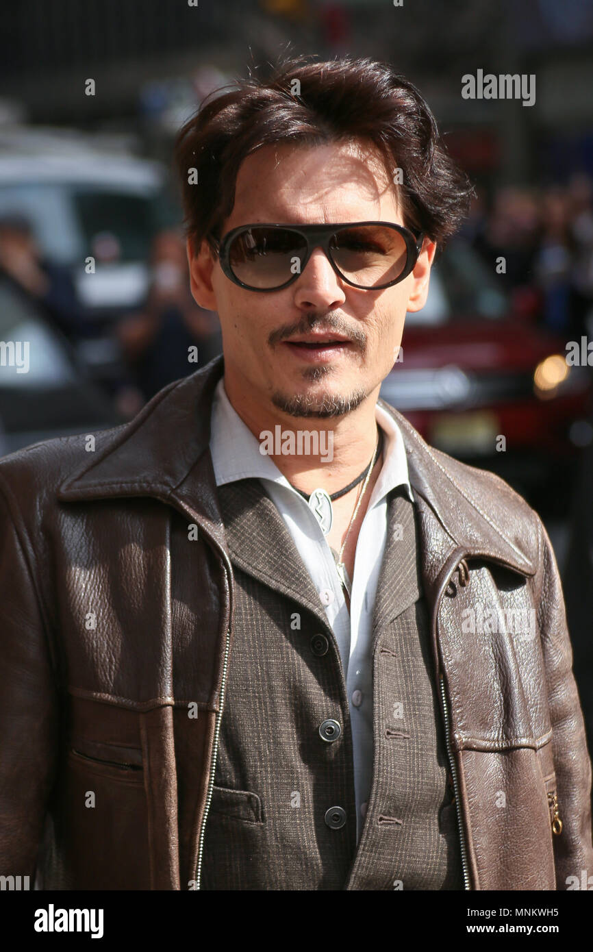 Actor Johnny Depp enters the 'Late Show With David Letterman' taping at the Ed Sullivan Theater on April 3, 2014 in New York City. Stock Photo