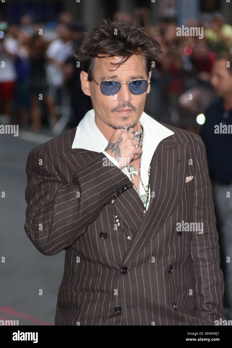 Johnny Depp arrives for the 'Late Show with David Letterman' at Ed Sullivan Theater on June 25, 2013 in New York City. Stock Photo