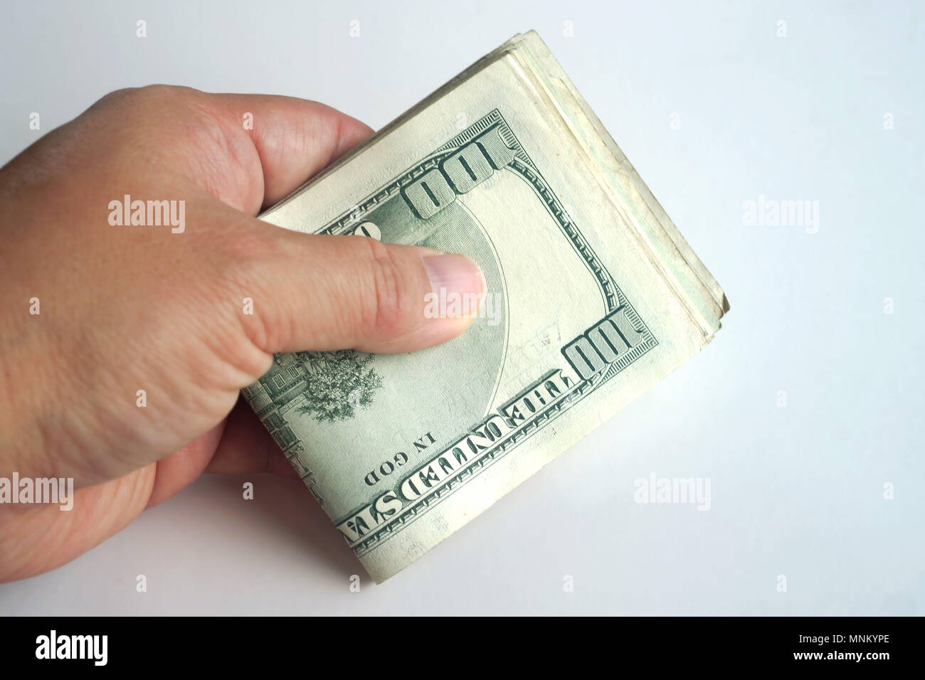 hand holding money, white background Stock Photo