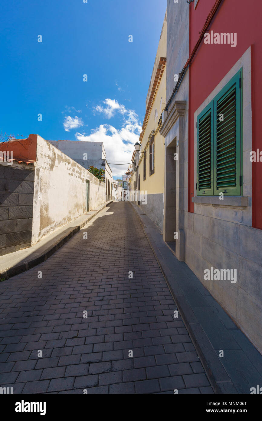Long empty street in Firgas town, Gran Canaria, Canary islands, Spain Stock Photo