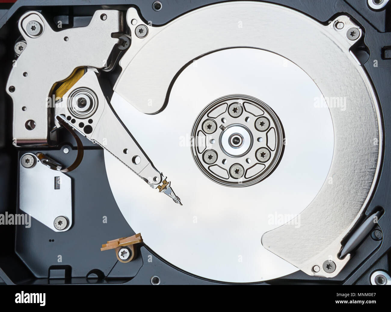 Close up inside of computer hard disk drive HDD Stock Photo