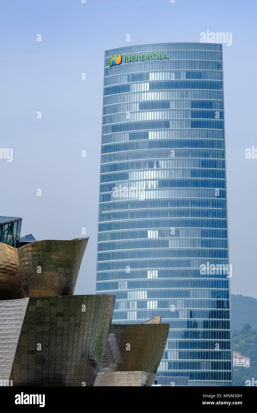 Iberdrola Tower, part of Guggenheim Musuem in foreground, Bilbao, Vizcaya, Pais Vasco, Spain, Stock Photo