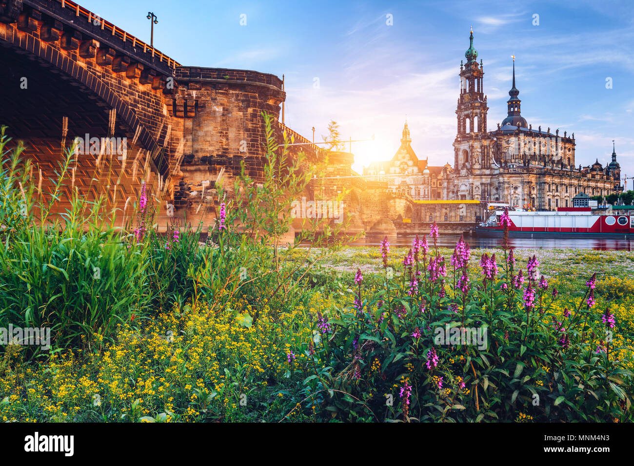Augustus Bridge (Augustusbrucke) and Cathedral of the Holy Trinity (Hofkirche) over the River Elbe in Dresden, Germany, Saxony. Stock Photo