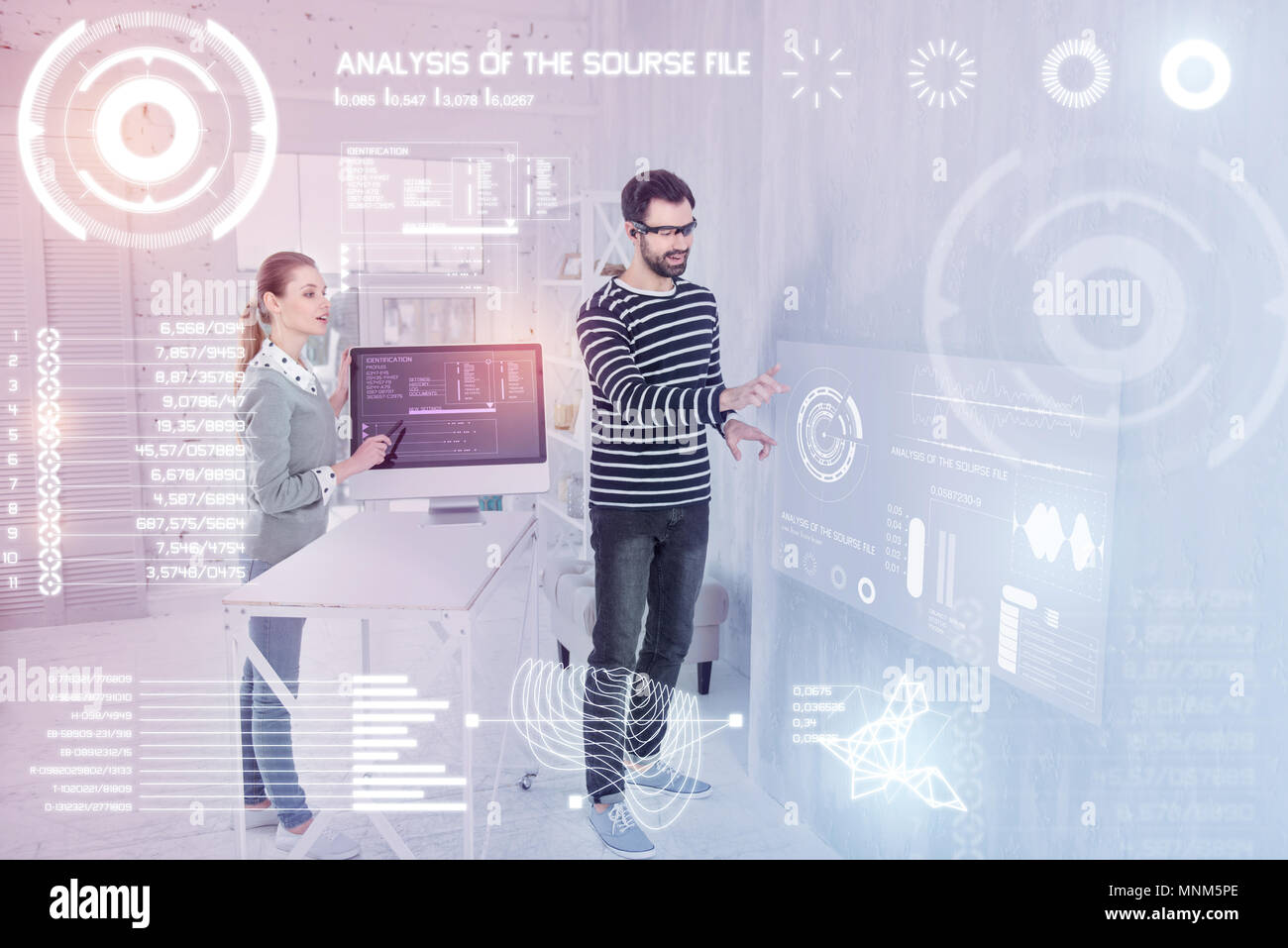 Smart programmers using virtual reality while working Stock Photo
