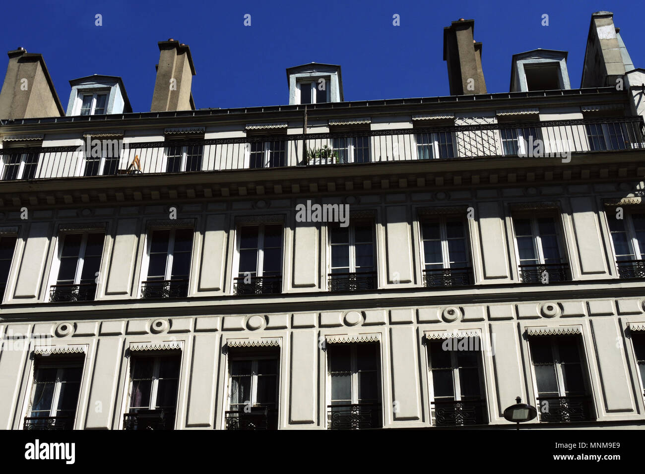PARIS FRANCE - PARIS WINDOWS AND FACADES - PARISIAN BUILDINGS AND BALCONIES - TYPICAL PARISIAN BUILDINGS - PARISIANS HOMES © Frédéric BEAUMONT Stock Photo