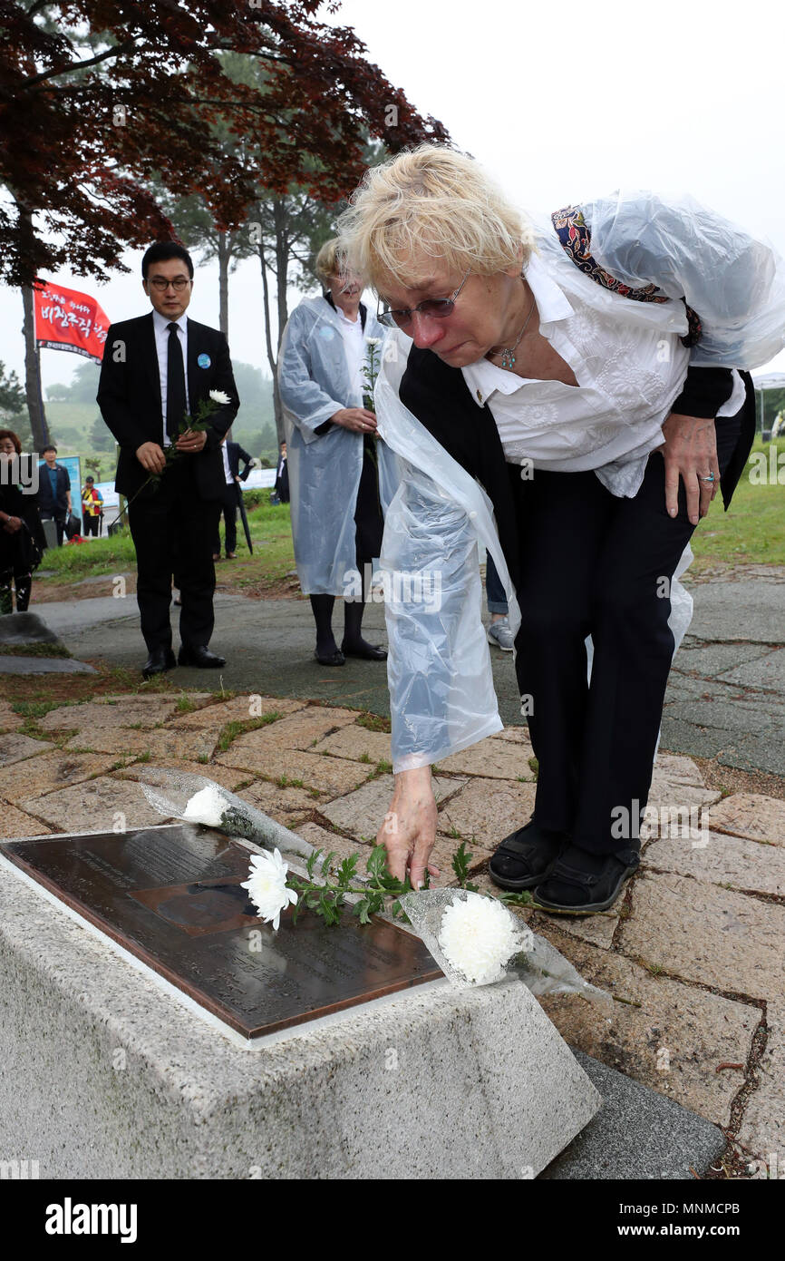 S Korea Marks Anniv Of 1980 Pro Democracy Uprising Edeltraut Bramstedt The Widow Of Late German Journalist Jurgen Hinzpeter Places Flowers In Front Of The Monument Commemorating Him At The Gwangju May 18