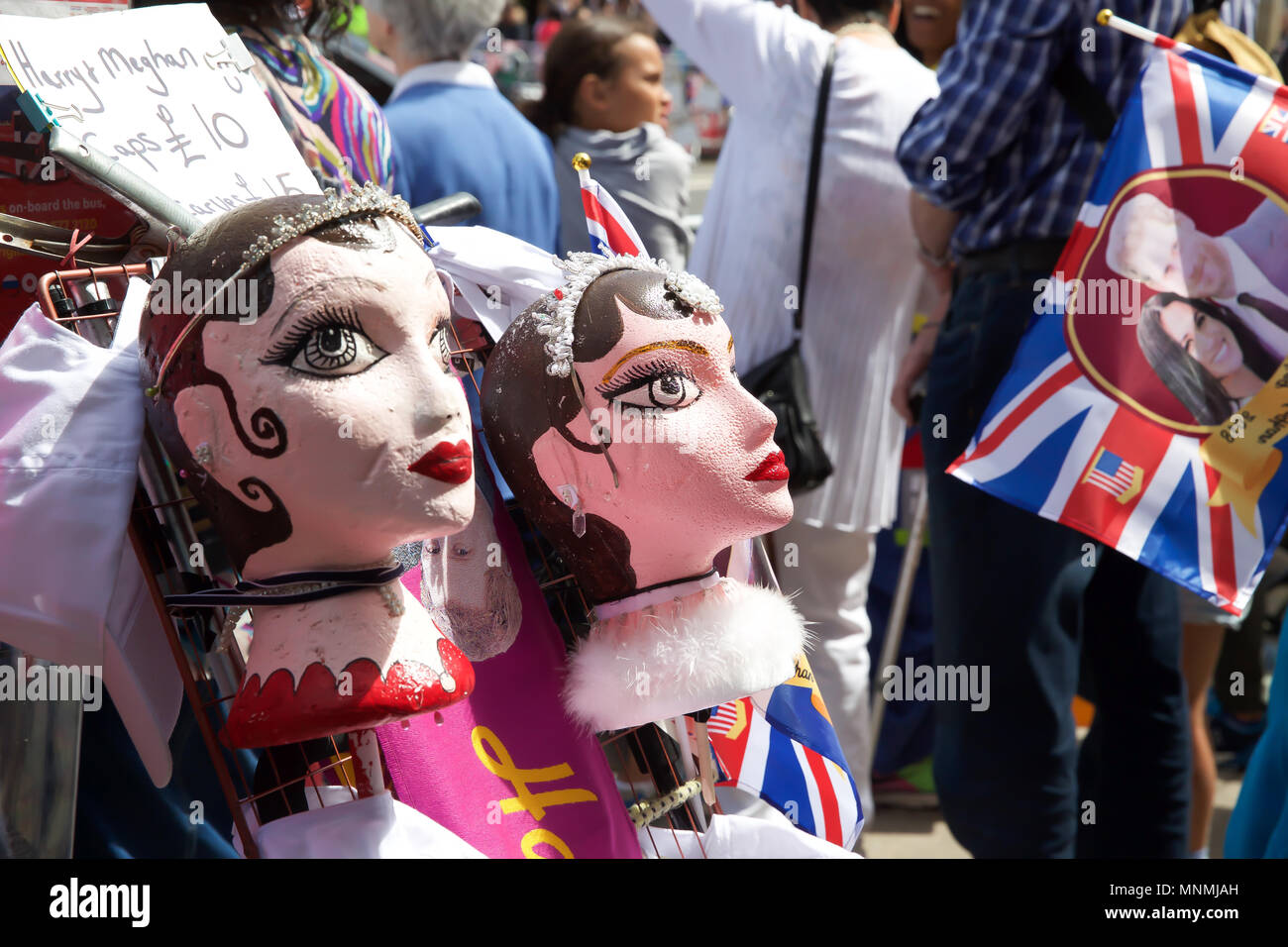 Windsor,UK,18th May 2018,The Royal Wedding preparations get underway as excitement builds in Windsor ahead of the marriage tomorrow of Prince Harry to Meghan Markle. There is an increased police presence and the shops are full of wedding souvenirs also lamp posts are adorned with union jack flags. Large crowds have descended on the town to soak up the atmosphere.Credit Keith Larby/Alamy Live News Stock Photo