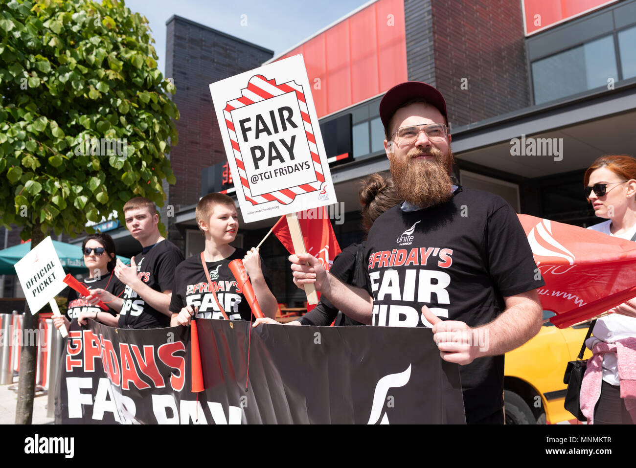 Milton Keynes, UK. 18th May 2018. Waiting staff at MK Stadium branch of TGI Fridays form a picket line in the first in on ongoing series of strikes in a dispute over tips. Credit: David Isaacson/Alamy Live News Stock Photo