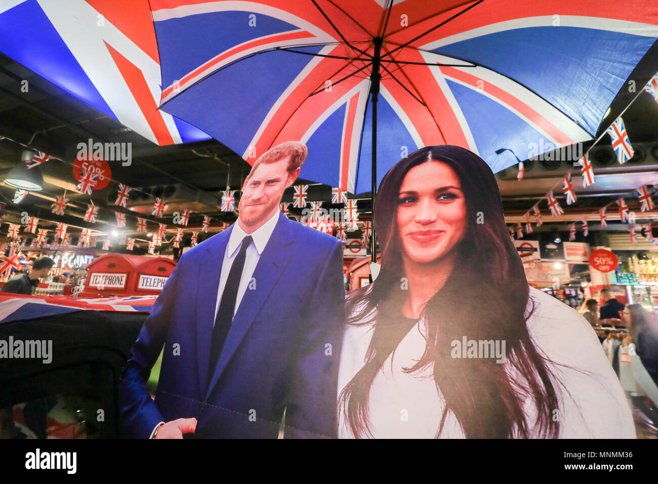 London UK. 18th May 2018. Souvenirs featuring Britain's Prince Harry and his fiance, US actress Meghan Markle are displayed in a Glorious Britain gift shop and provide a popular tourist attraction in Picaddily as the couple tie the knot on 19 May Credit: amer ghazzal/Alamy Live News Stock Photo