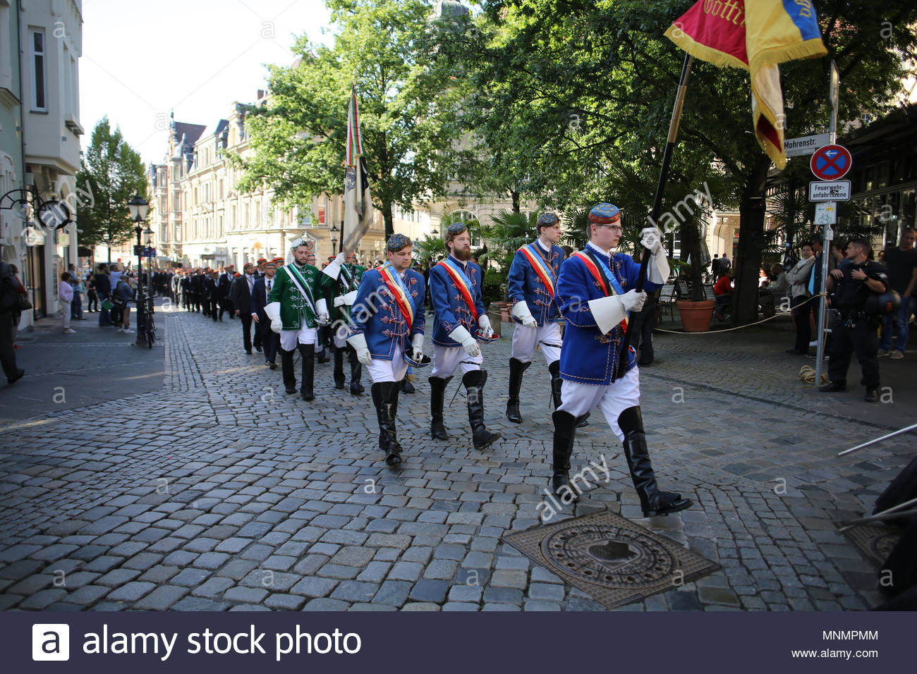 Coburg, Germany. 18th May, 2018. Participants march through the city centre in Coburg, Germany where the annual meeting of students' associations from Germany and Austria, has officially been opened. Each year the student associations gather to celebrate the traditional values they espouse. As is the case most years there was a small protest against the event and a heavy police presence was maintained. Credit: reallifephotos/Alamy Live News Stock Photo