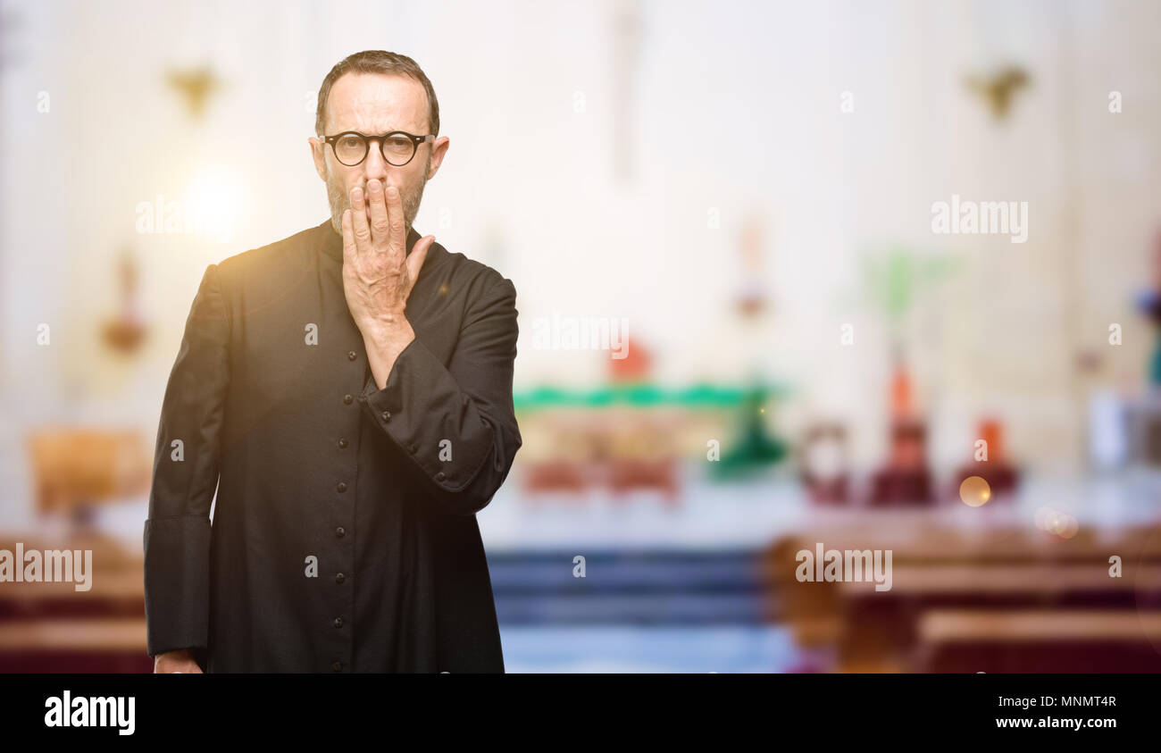 Priest Religion Man Covers Mouth In Shock Looks Shy Expressing Silence And Mistake Concepts 