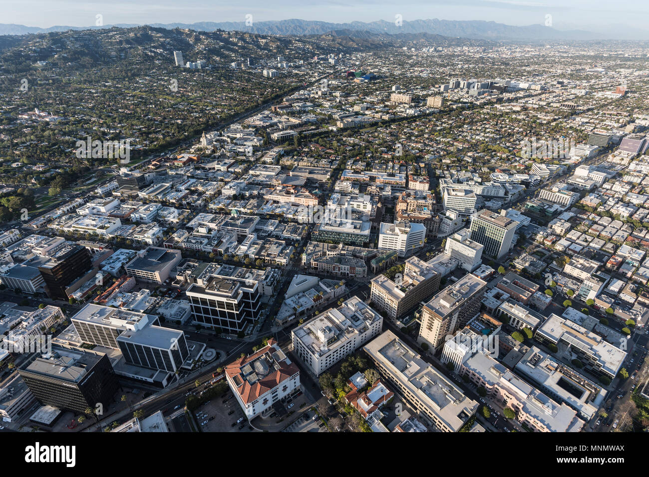 Beverly Hills, California, USA - April 18, 2018:  Aerial view of Wilshire Bl and downtown Beverly Hills with Los Angeles and West Hollywood in the bac Stock Photo