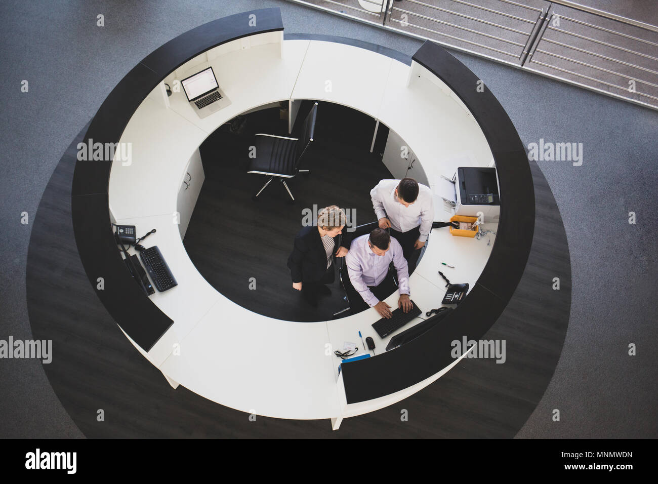 Overhead shot of people working in an office Stock Photo
