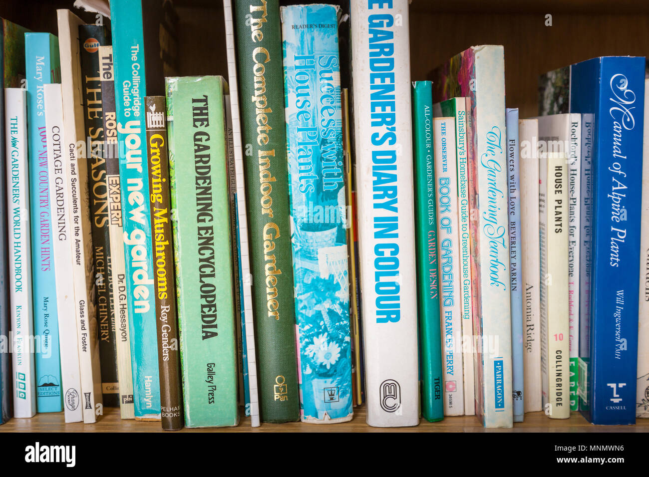 Bookshelf with gardening books Stock Photo