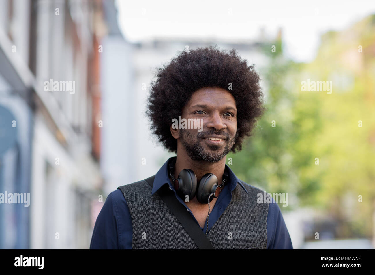 African American walking in city Stock Photo