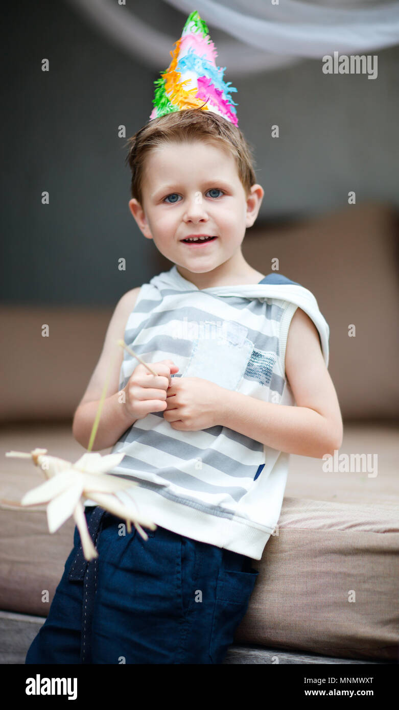 Portrait of little boy on birthday party Stock Photo