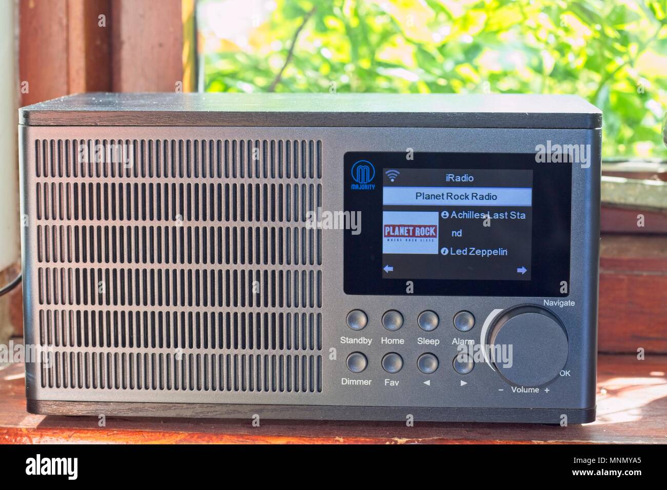 Internet radio on a kitchen window sill, tuned to Planet Rock, working off  household WiFi Stock Photo - Alamy