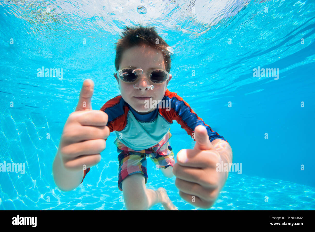 Portrait of a cute little boy swimming underwater Stock Photo Alamy