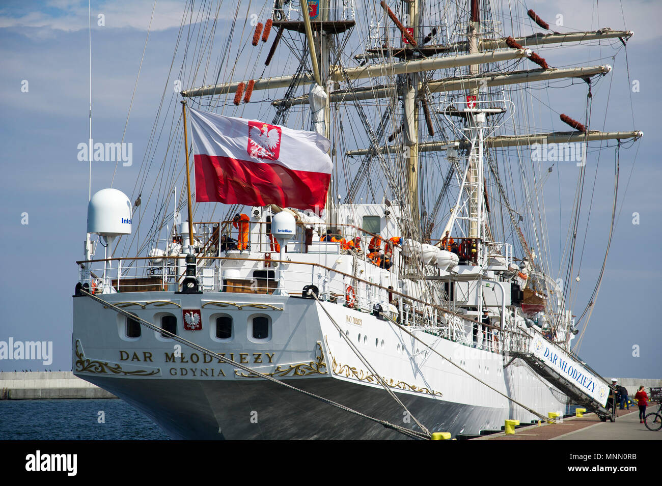 Dar Mlodziezy (Gift of the Youth), Polish full-rigged sailing ship of Gdynia Maritime University, during preparation to The Independence Sail to make  Stock Photo