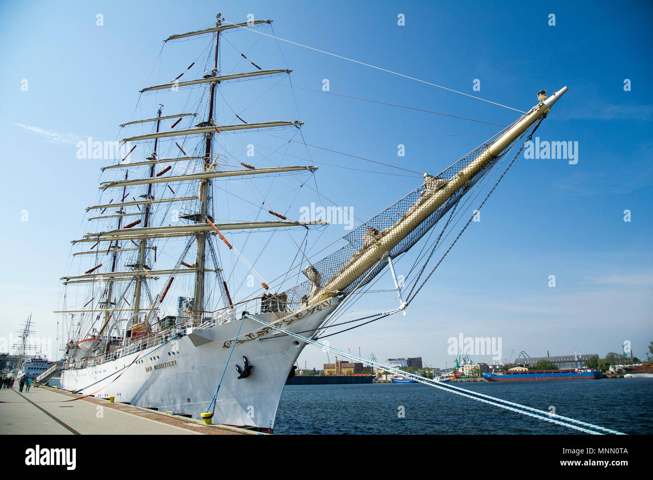 Dar Mlodziezy (Gift of the Youth), Polish full-rigged sailing ship of Gdynia Maritime University, during preparation to The Independence Sail to make  Stock Photo