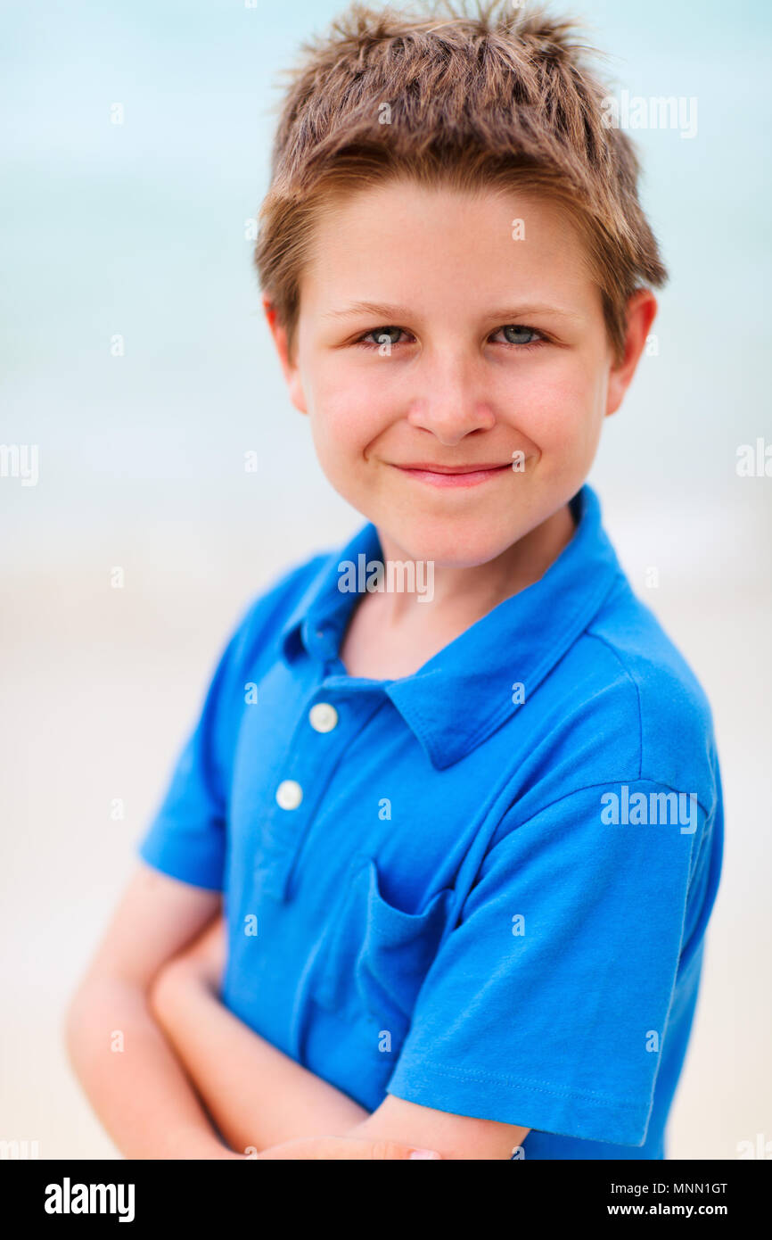 Boy in Blue Jersey Smiling · Free Stock Photo