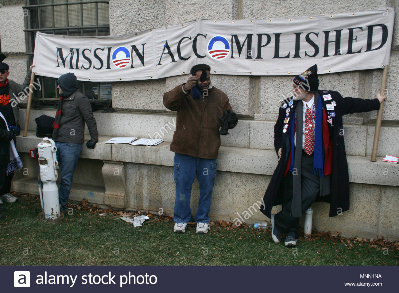 A Man Wearing American Political Buttons From Many Inaugurations