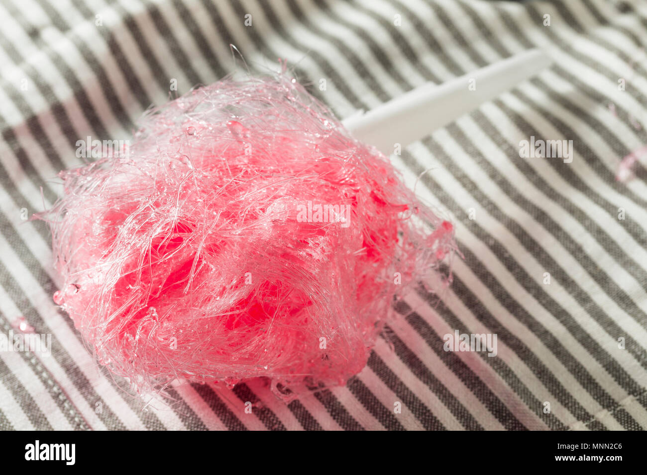 Sugary Pink Homemade Cotton Candy Floss On A Stick Stock Photo Alamy