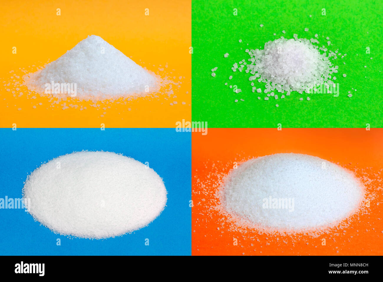 Pile of sugar on blue, red, yellow and green backgrounds. Collection Stock Photo