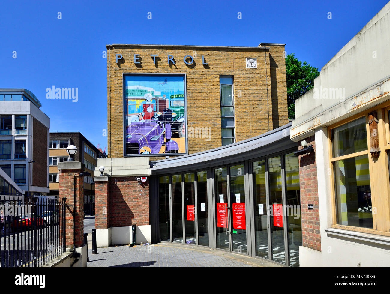 Ceramic tile mural (Brian James: 2011) at the site of the former Ridgmount Petrol Station (1926) on the corner of Store Street and Ridgemmount Street, Stock Photo