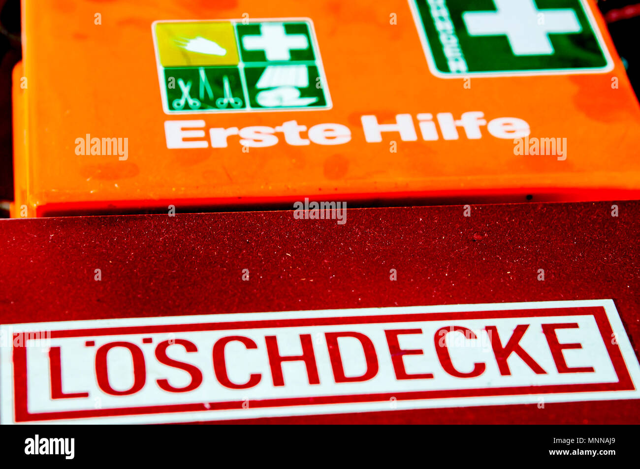 Fire blanket and first aid box; Löschdecke und Erste Hilfe Kasten Stock Photo