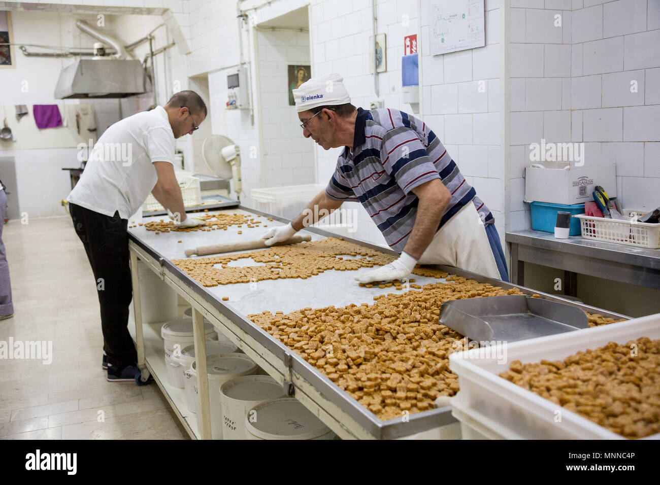 Palermo, Sicily, April 24, 2018: Employees are working in a traditional Sicilian Caramel factory Stock Photo