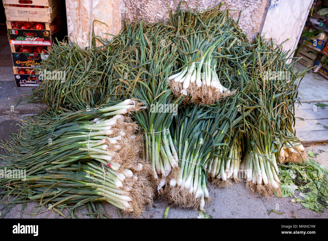 Green onion bunches ready for sale on a market in Sicily Stock Photo ...