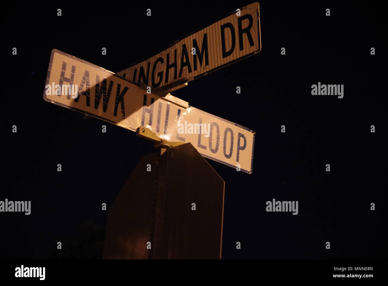 Tampa, Florida / USA - May 5 2018: Billingham Drive and Hawk Hill Loop Crossing Street Sign Stock Photo
