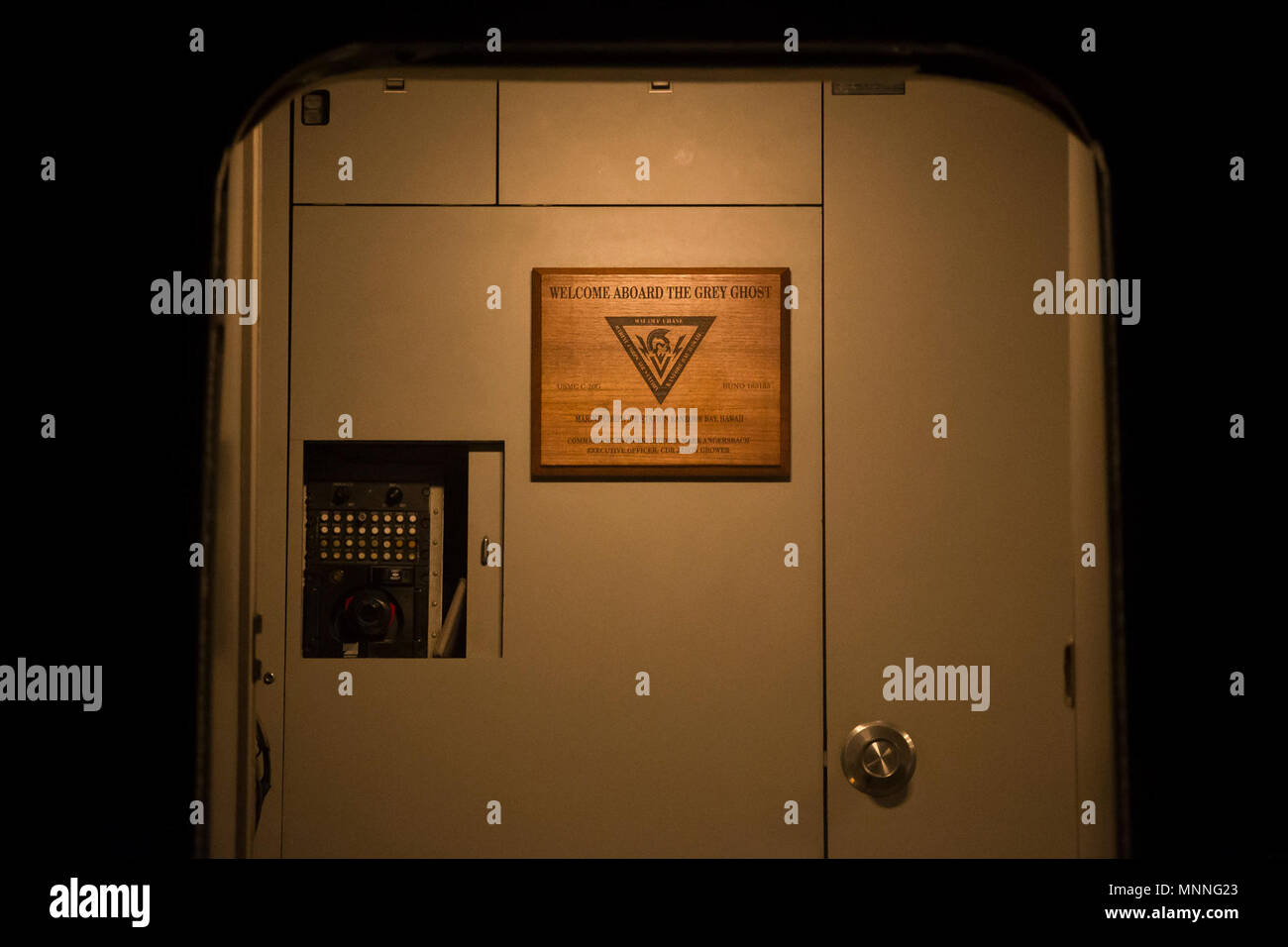 A welcoming plaque is on display inside of The Grey Ghost, a C-20G