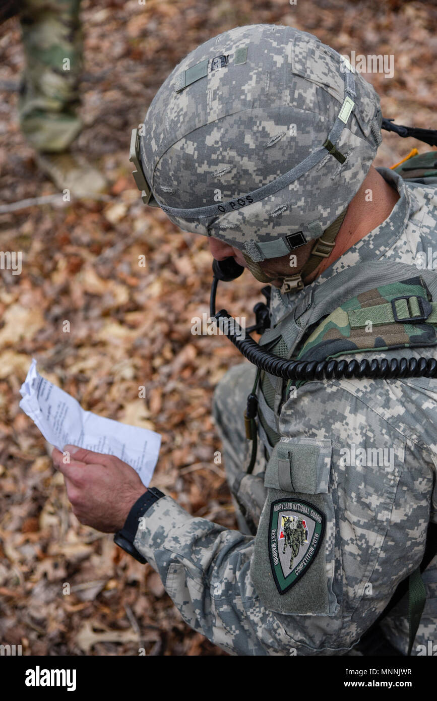 U.S. Army Spc. Saum Salehi, 2-20th SF Group (Abn.), Augmentation Det.,  makes a 9-line MEDEVAC request during the warrior task of the Maryland  National Guard Best Warrior Competition on March 15, 2018,