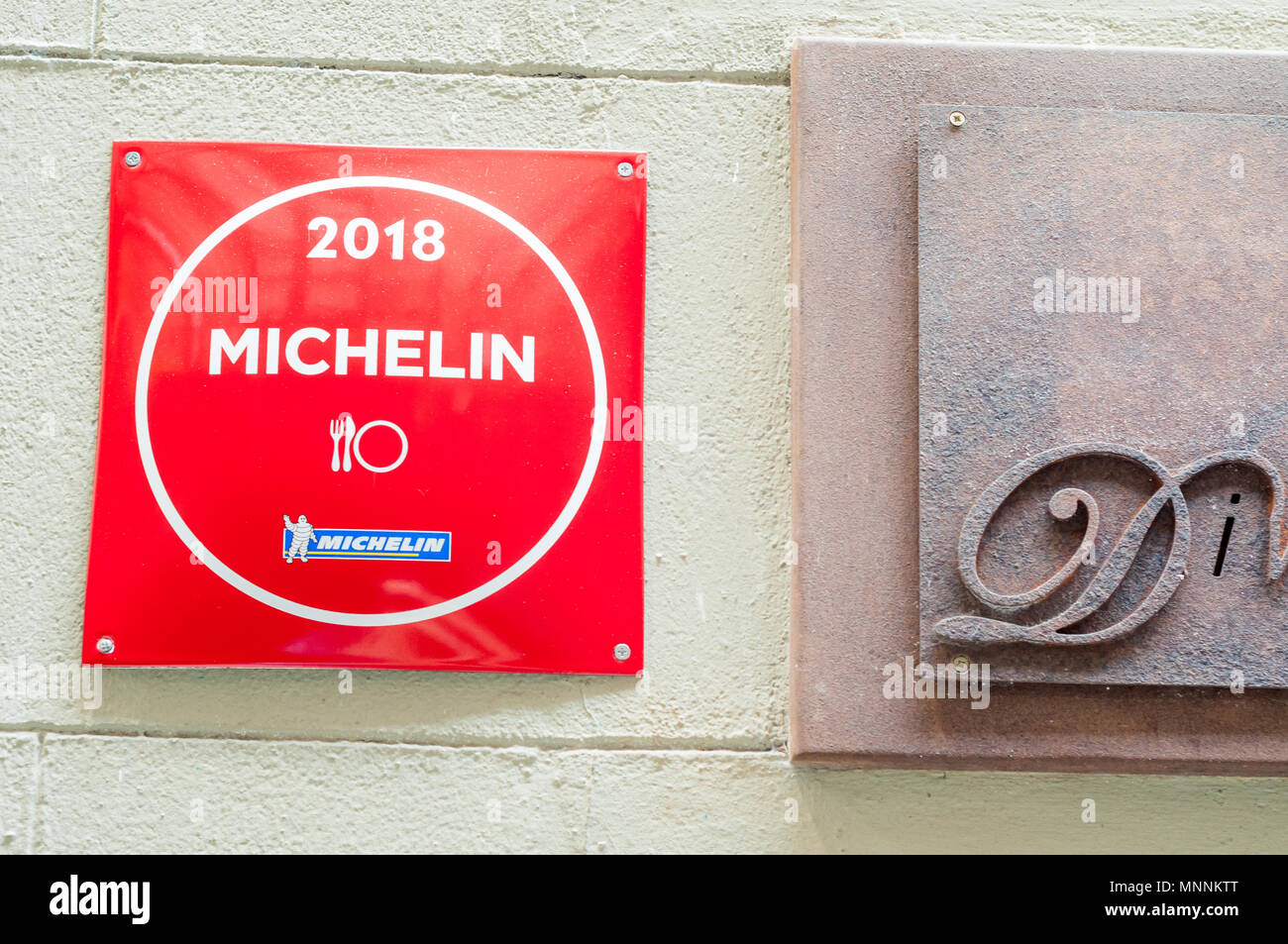 Michelin guide symbol outside Divinum Restaurant, Girona, Catalonia, Spain Stock Photo