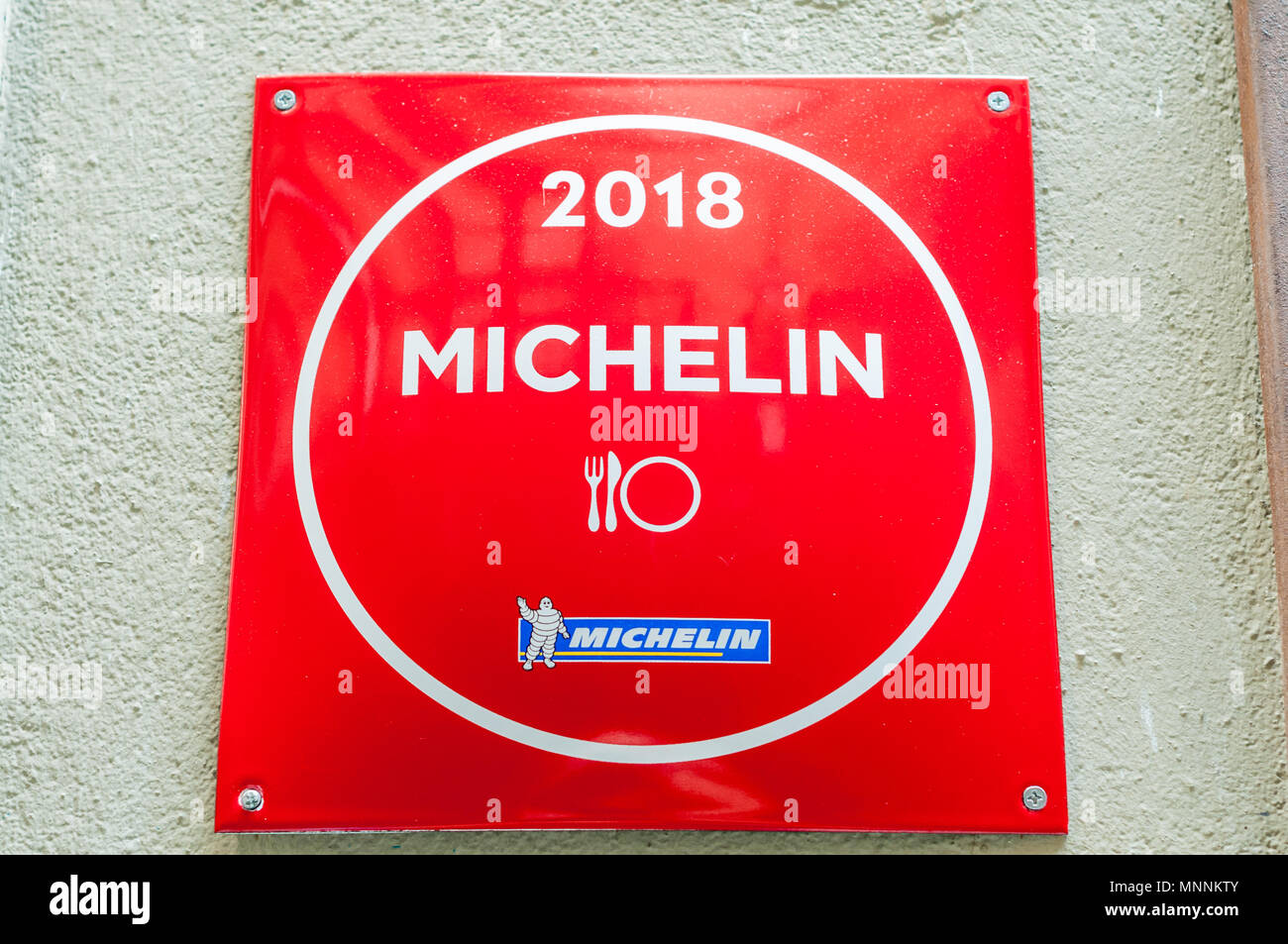 Michelin guide symbol outside Restaurant, Girona, Catalonia, Spain Stock Photo