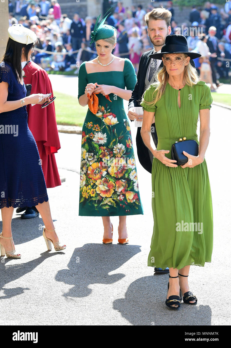 Lady Kitty Spencer (centre) and Victoria Aitken (right) arrive at St George's Chapel at Windsor Castle for the wedding of Meghan Markle and Prince Harry. Stock Photo