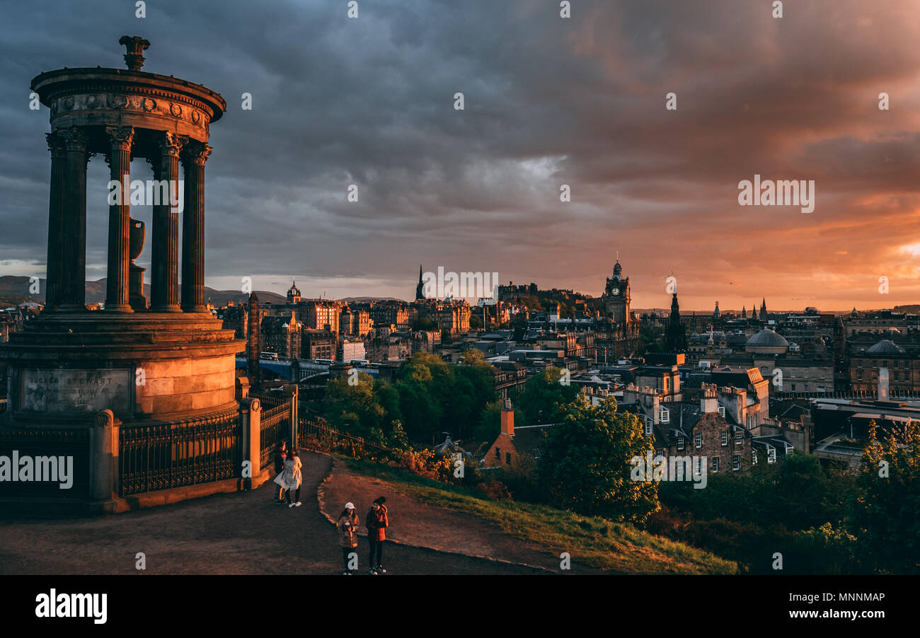Calton Hill, Edinburgh sunset with dramatic red clouds Stock Photo