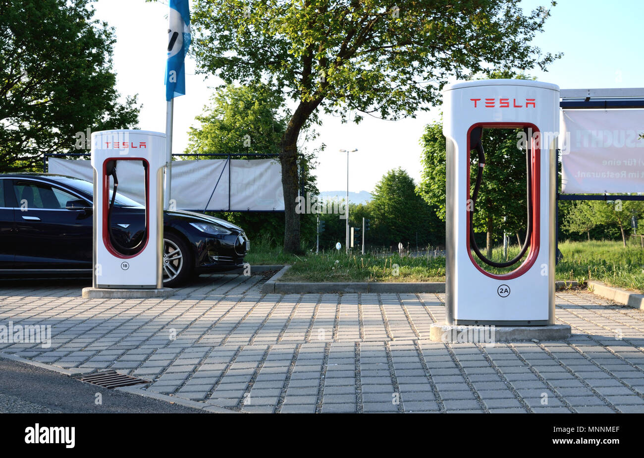 Ellwangen, Germany - May 10, 2018: Tesla Model S charging at Supercharger Stations in Ellwangen. Stock Photo