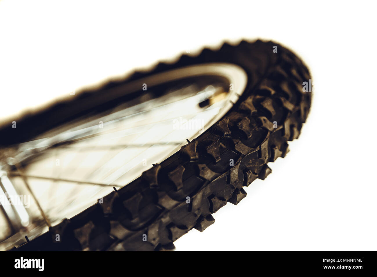 Front wheel of bicycle. Rubber bicycle tire closeup. Mountain bike