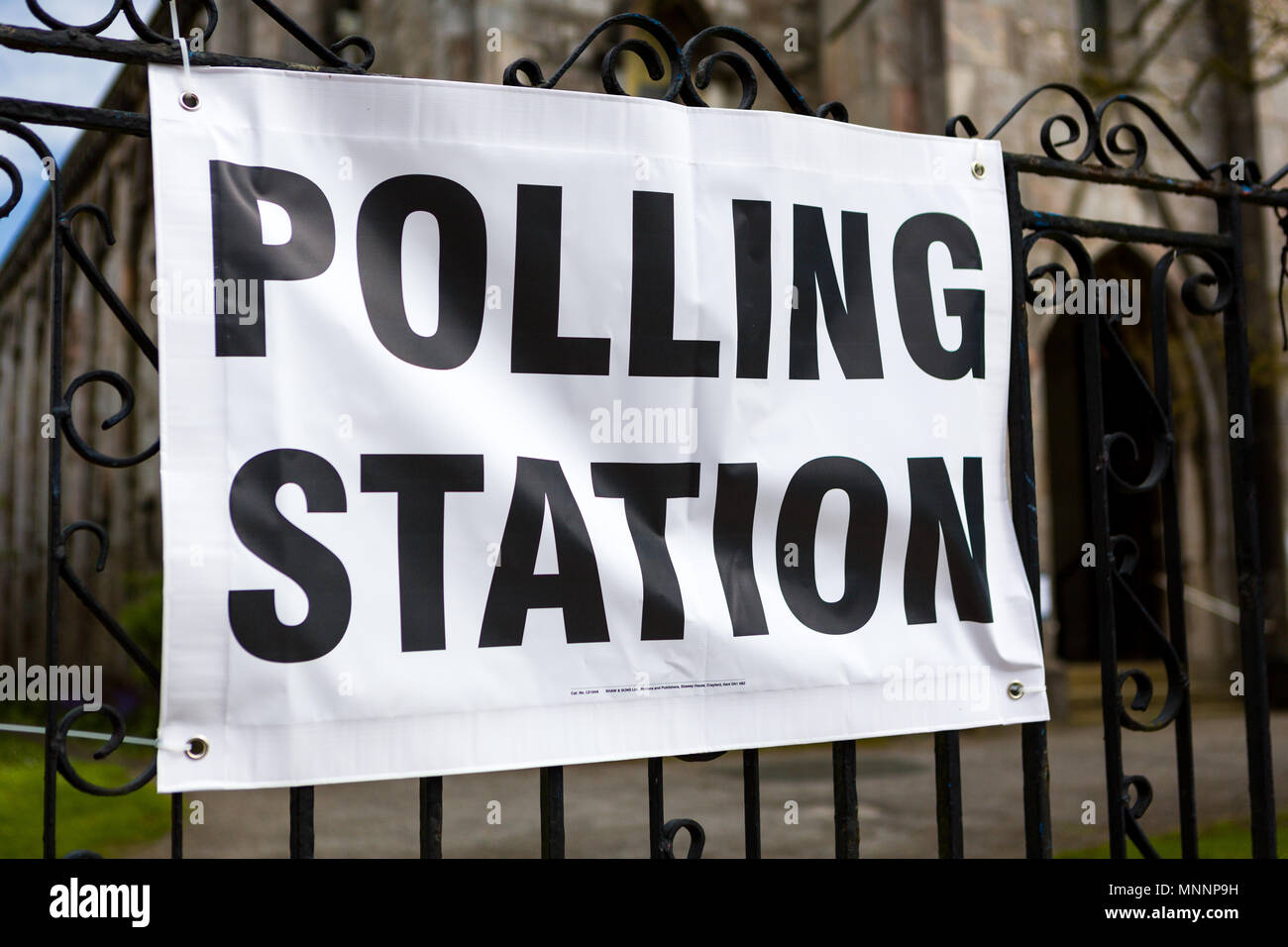 Polling Station Sign On An Ironwork Railing. Stock Photo