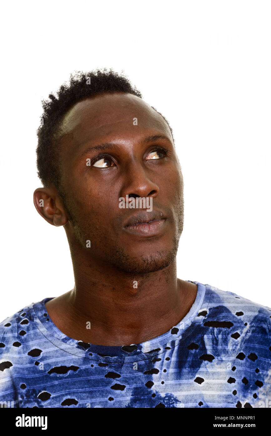 Young black man thinking hi-res stock photography and images - Alamy