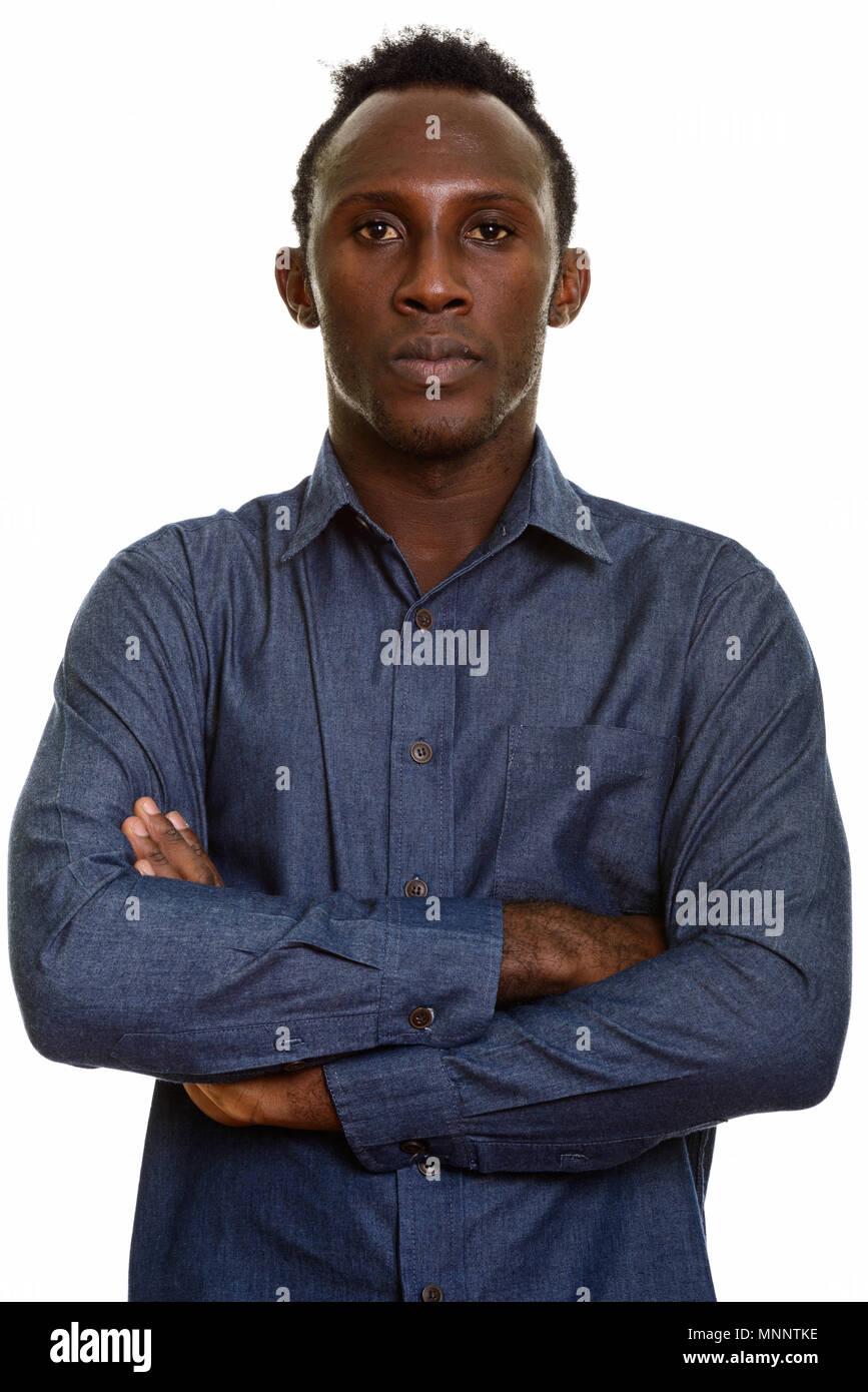 Young black African man with arms crossed Stock Photo - Alamy