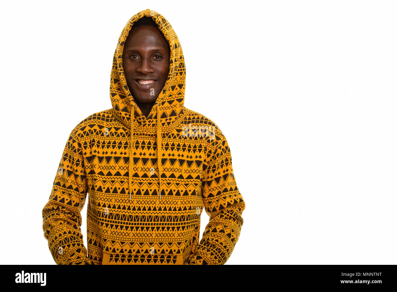 Young happy black African man smiling and wearing hoodie Stock Photo ...