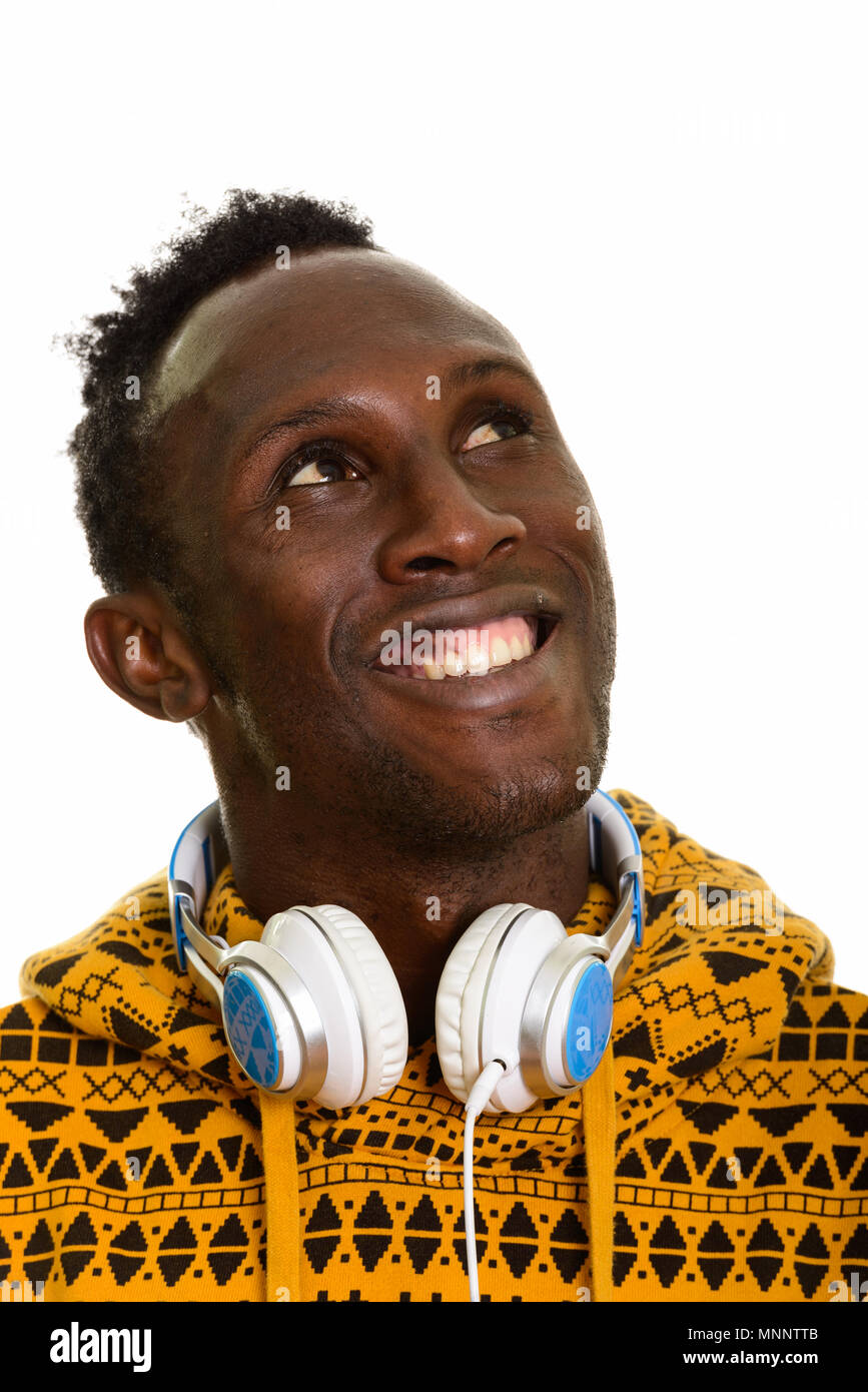 Face of thoughtful young happy African man smiling and wearing h Stock ...
